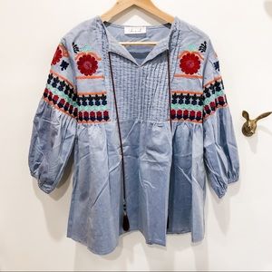 Peasant top in chambray with embroidery on…